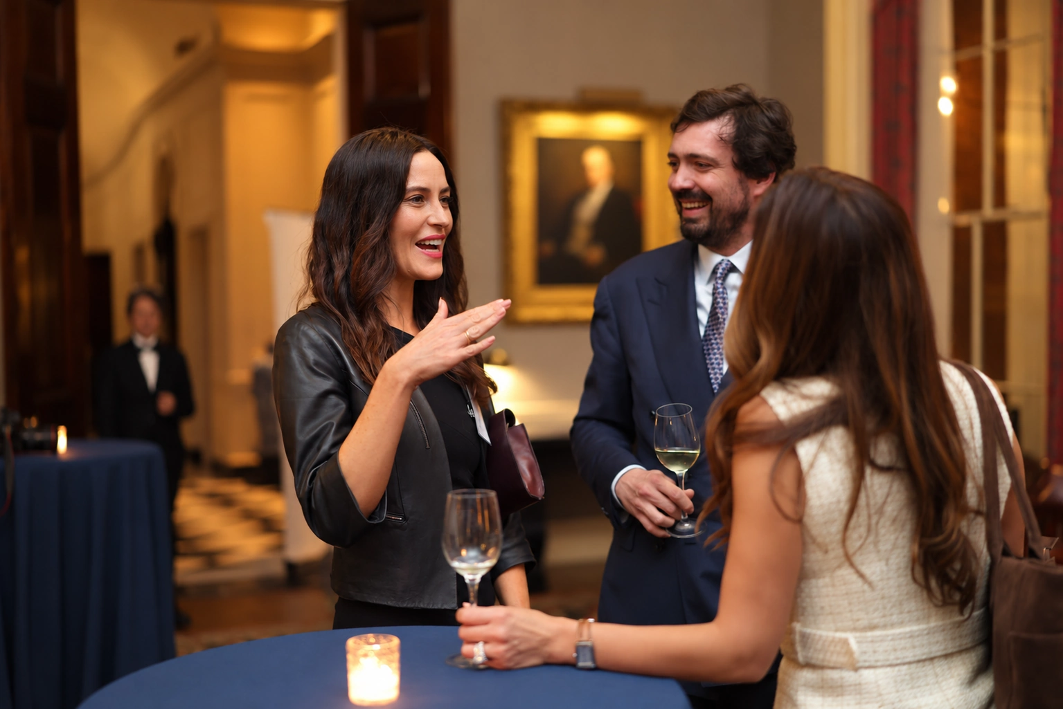 Guests talking around a cocktail table