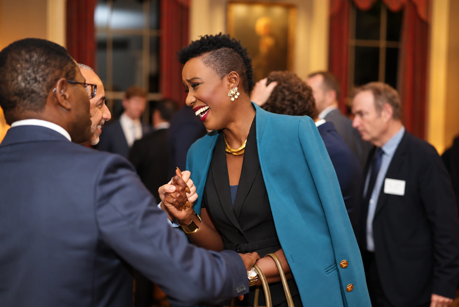 Guests networking during an evening reception