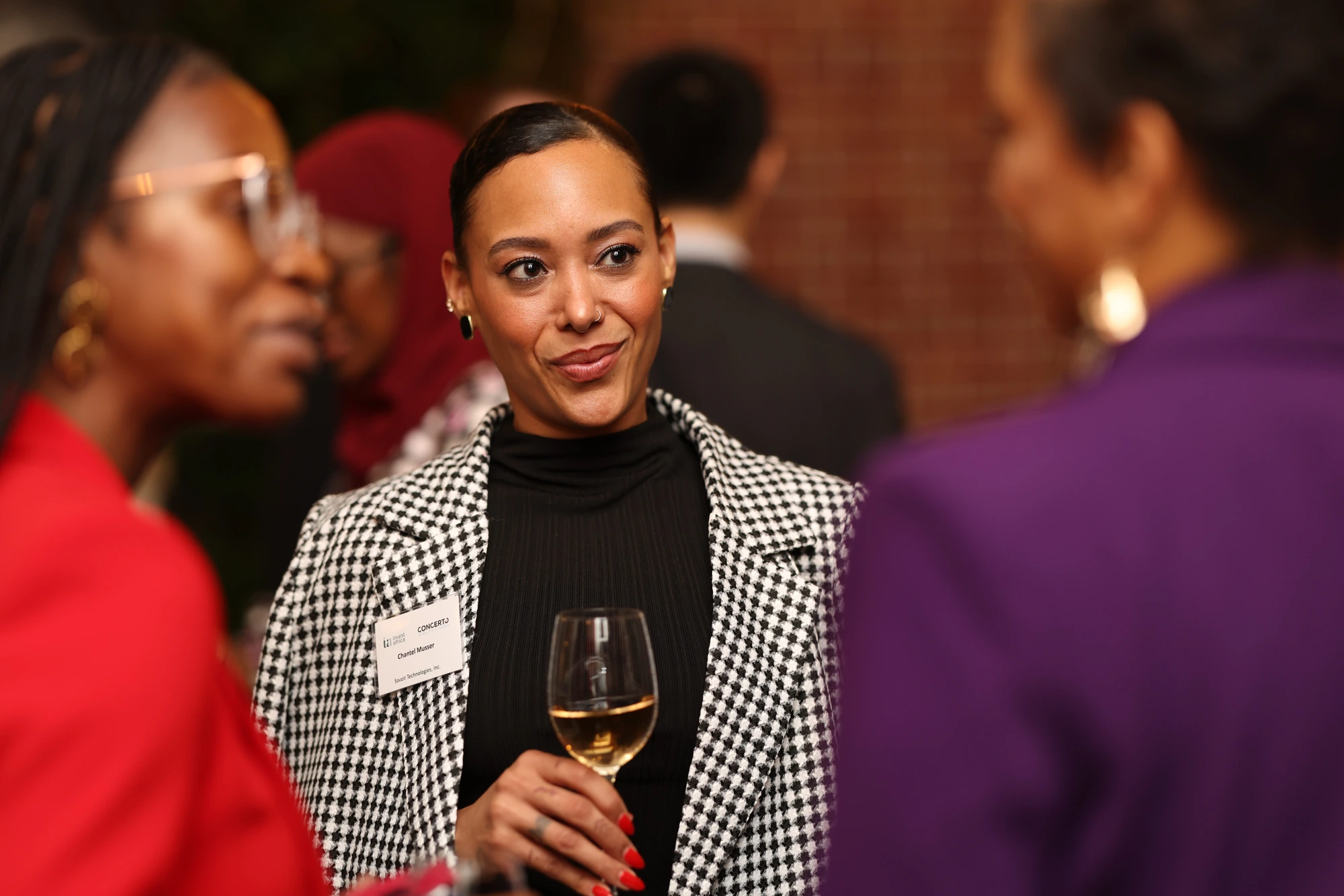 A candid conversation at a networking reception