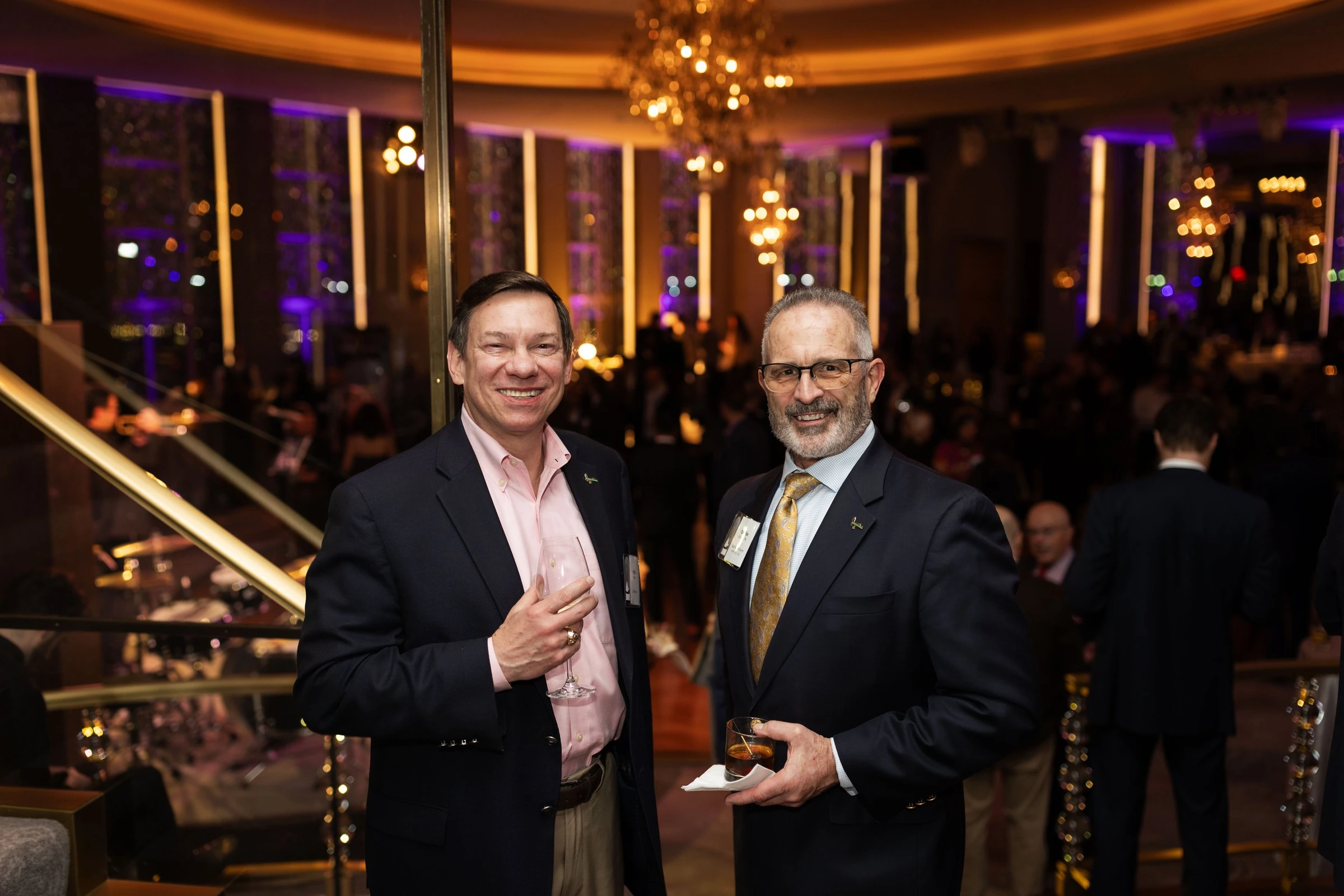 Two guests at a formal evening reception