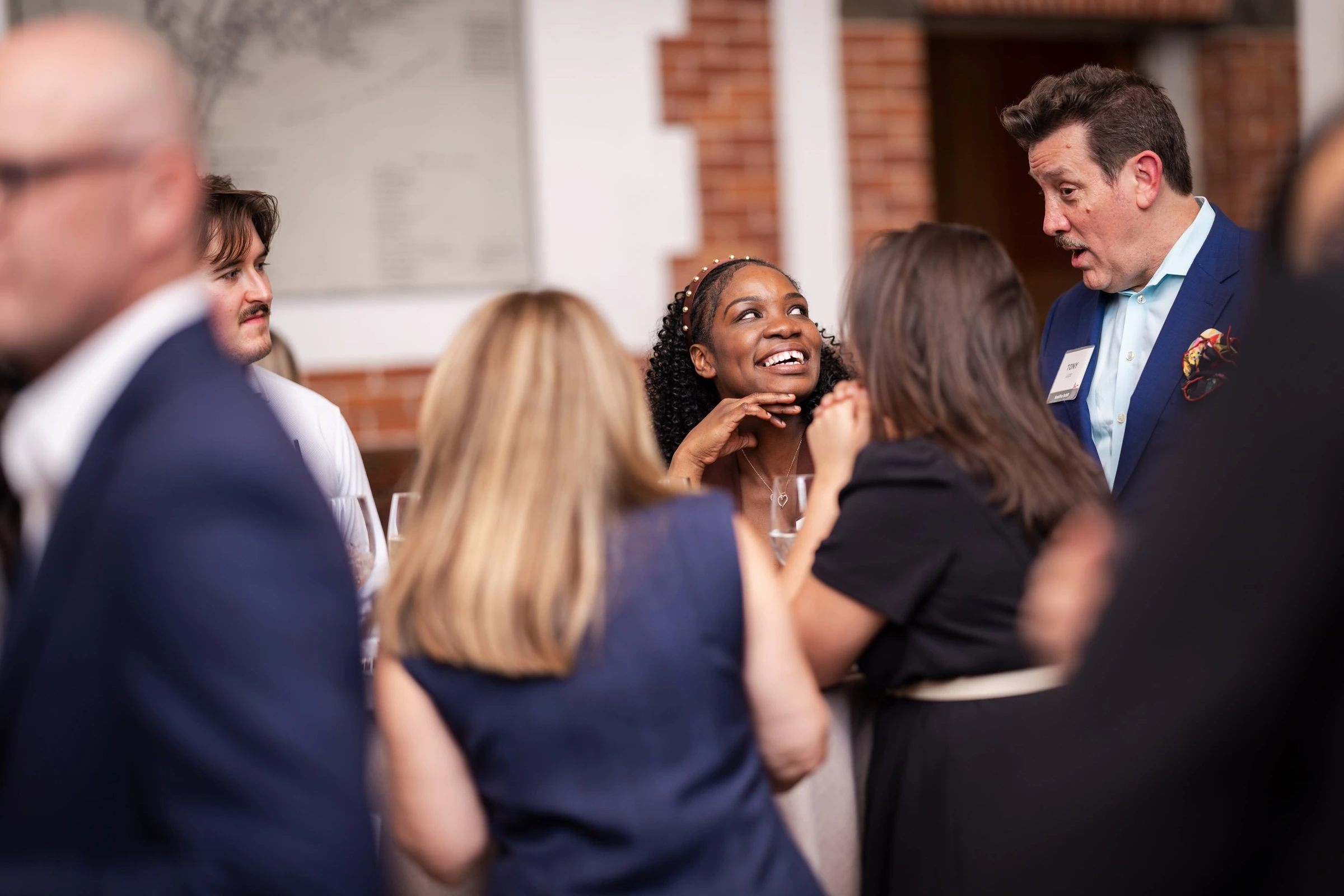 Colleagues chatting during a business reception